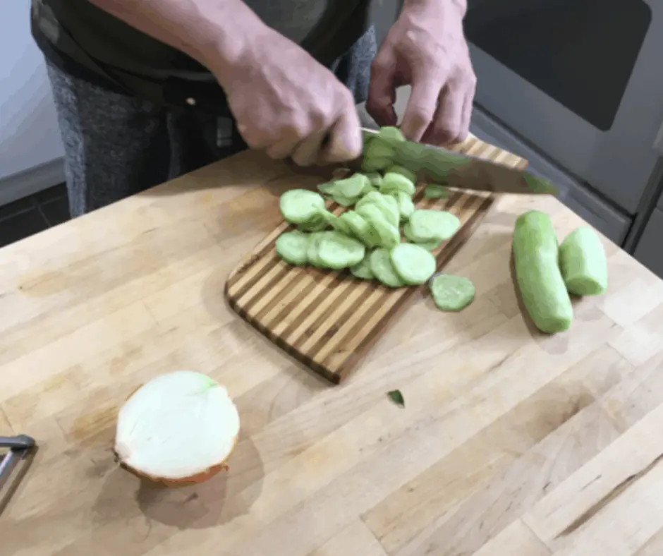 chopping cucumber