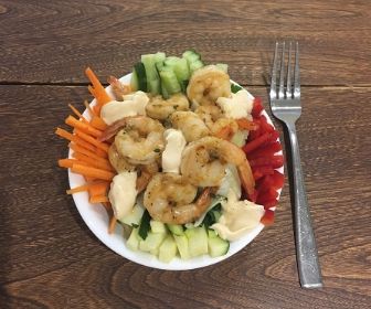 eating minimalist shrimp veg bowl