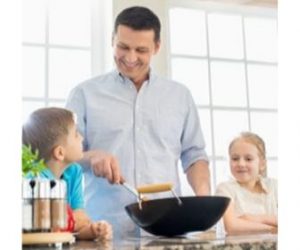 Family cooks healthy budget-friendly stir fry