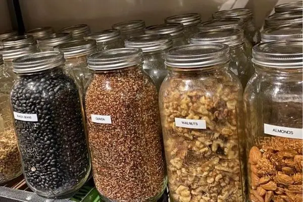 labelled mason jars in the pantry