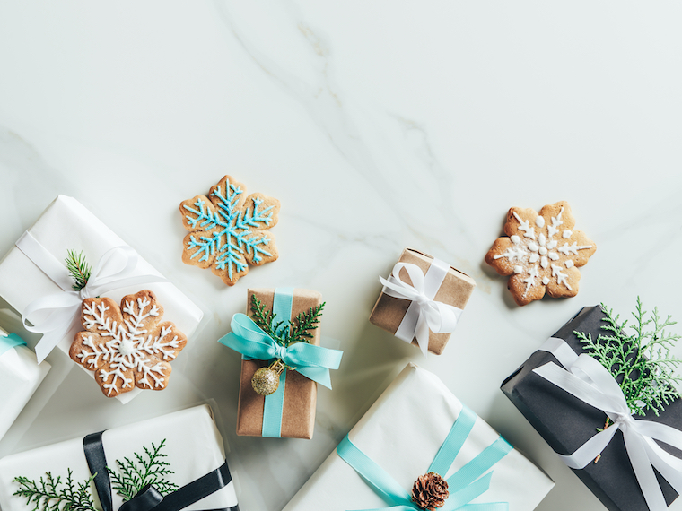 white, black, teal minimalist gifts for Christmas flatlay