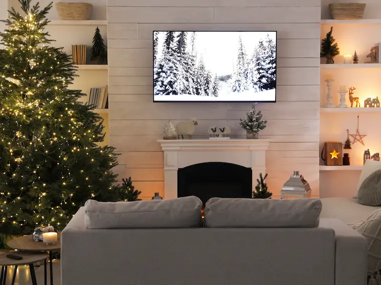 Cozy living room with minimalist decor and Christmas tree